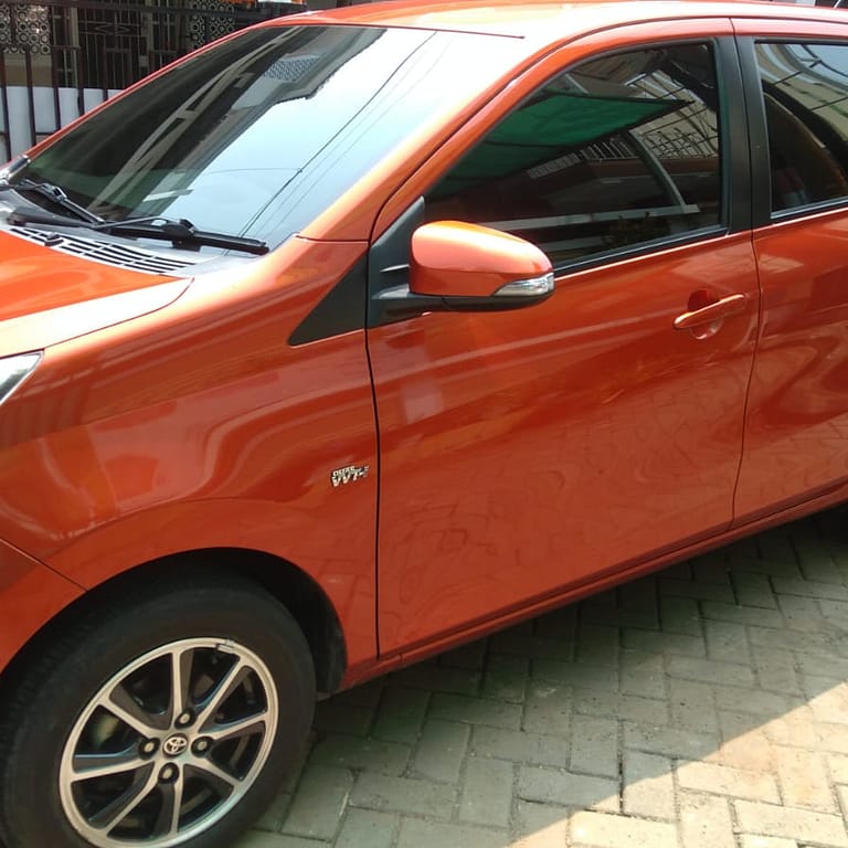 Dijual Mobil Calya G Matic Warna Orange Metalic - Carwash Studio Garage