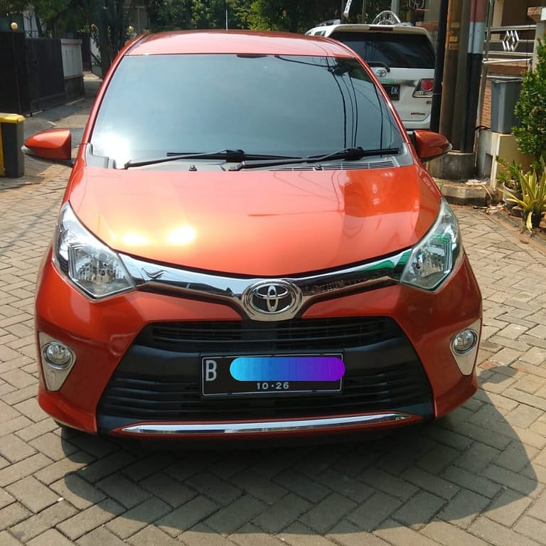 Dijual Mobil Calya G Matic Warna Orange Metalic - Carwash Studio Garage